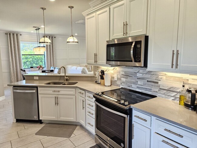 Building Photo - Stunning Model Home – 2 Bedrooms plus Den,...