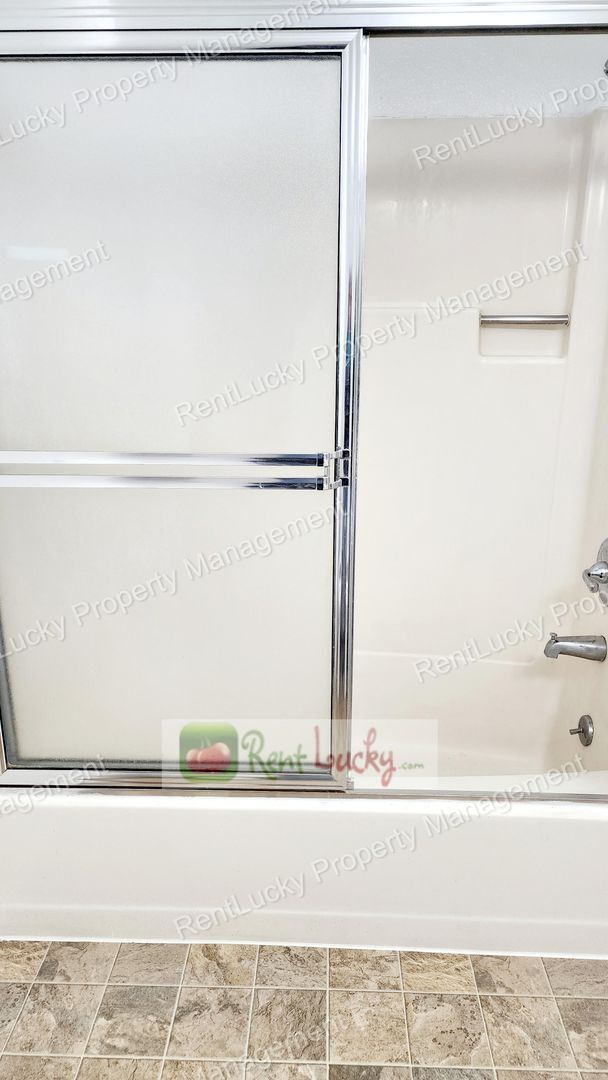 Building Photo - Green-Parkland Duplex