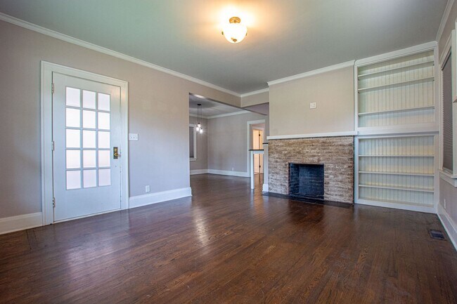 Building Photo - Adorable Brick 4 Bedroom Ranch with Finish...