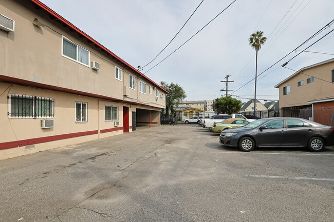 Building Photo - Paul Ling Apartments - Exposition