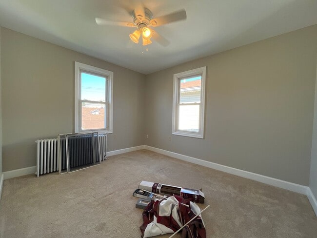 Building Photo - Move-in ready and well-maintained, this 4-...