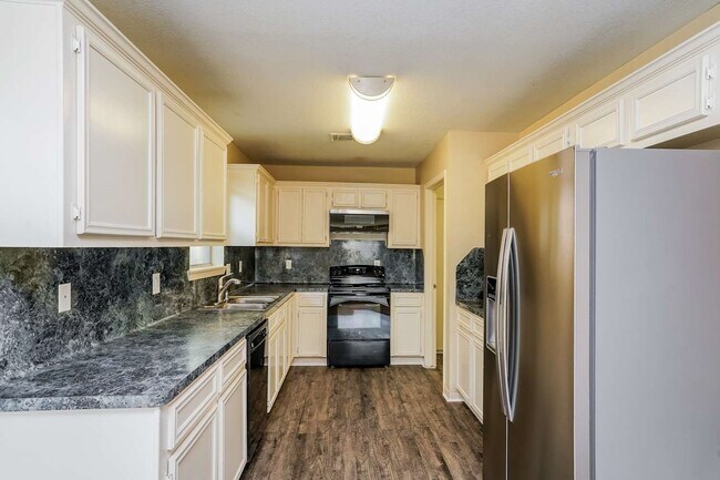 Building Photo - 6902 Fawn River Dr