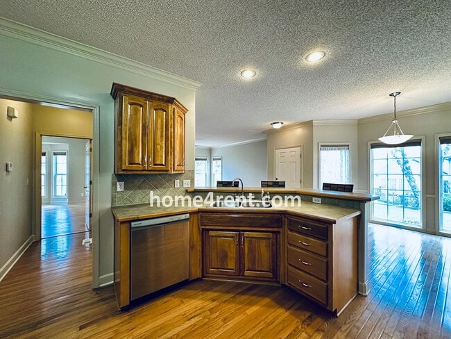 Building Photo - Maintenance Free! Main level Master, Finished Basement and Wood Floors in the Kitchen! *Brand New...