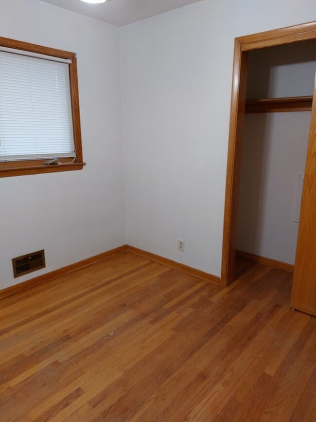 Building Photo - Corner lot with fenced in backyard!