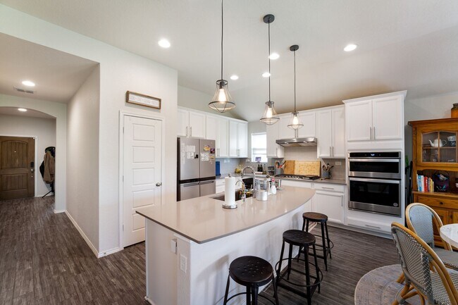 Building Photo - 4 Bedroom Home with Stone Patio, Built-In Gazebo & Amenity-Rich Community Living