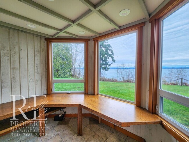 Building Photo - MOVE-IN SPECIAL: 50% OFF FIRST MONTHS RENT - Waterfront Rustic Retreat with Vaulted Ceilings, Pic...