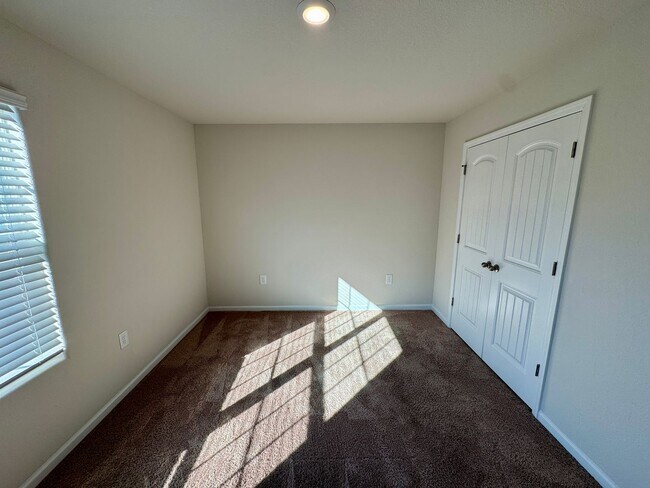 Building Photo - Located in Creedmore Hills a 4BR/2.5BA home with 2 car garage