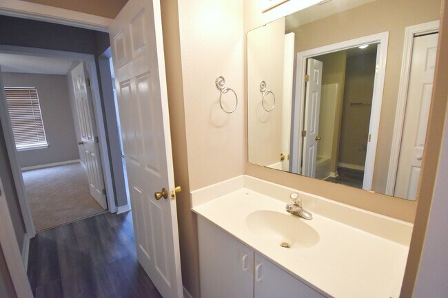 Building Photo - 2BR Patio Home with Open Layout, LVP Flooring, Private Fenced Yard, HOA Lawn Care & Convenient Bl...