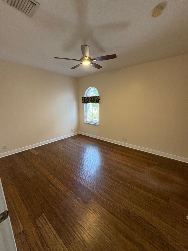 Building Photo - Spacious 3/3.5 3 car garage home in Palm City
