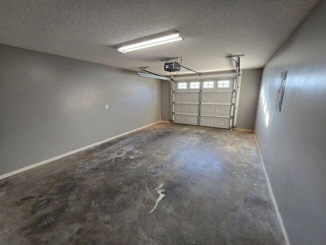 Building Photo - Rent INCLUDES water/sewer and yard maintenance.