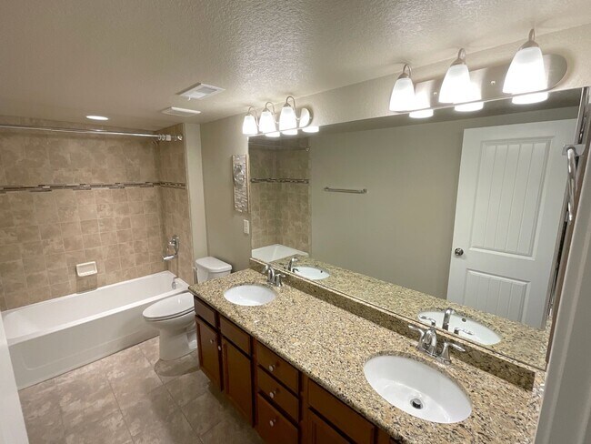 Building Photo - 4 Bedroom Home Available Near Woodmoor Dr ...