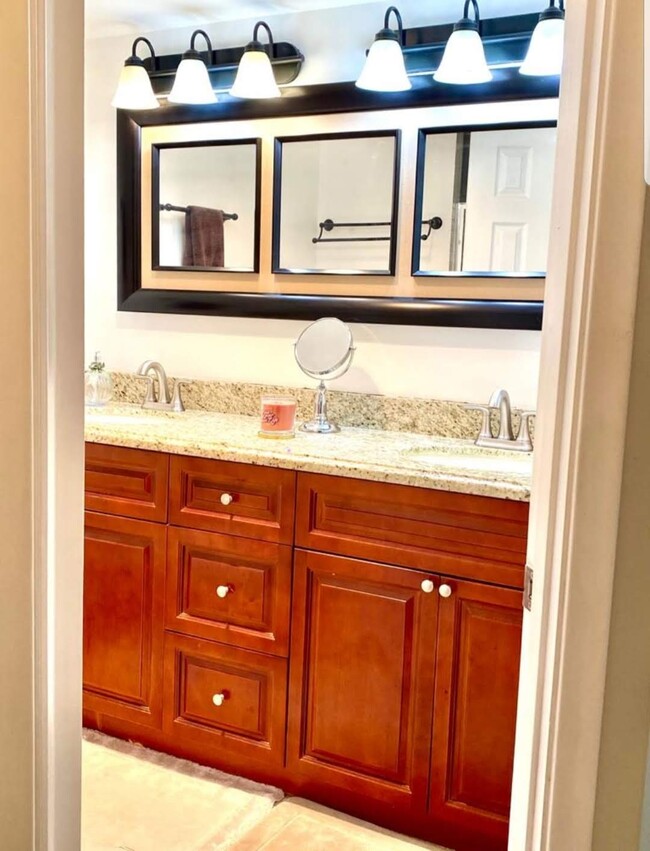 Master Bathroom his/her sink - 2200 NE 33rd Ave