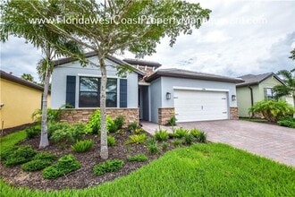 Building Photo - OUTSTANDING 4 BEDROOM/2 BATH SOUTH VENICE HOME! PRESERVE at WEST VILLAGES!  ANNUAL LEASE UNFURNIS...