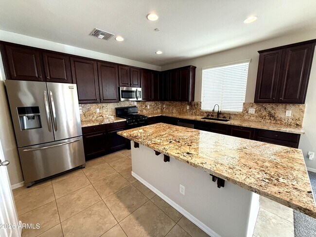 Building Photo - 9237 W Coolbrook Ave