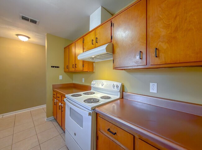 Building Photo - LOVELY & Modern NW 2/1 w/ New Flooring & Huge Privacy Fenced Yard that Inc Lawn Maintenance! Avai...