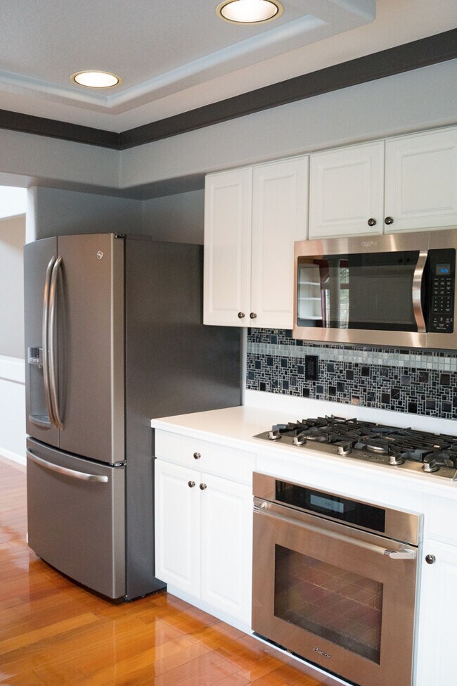 Building Photo - Evolve Real Estate: Available Immediately 3 Bedroom on a Huge Lot Facing Open Space! No Pets.