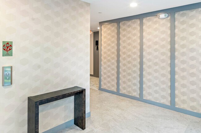 Building Photo - 1 Bed • 1.5 Bath • Garage Parking • New Luxury Building – Available now, February, March or April...