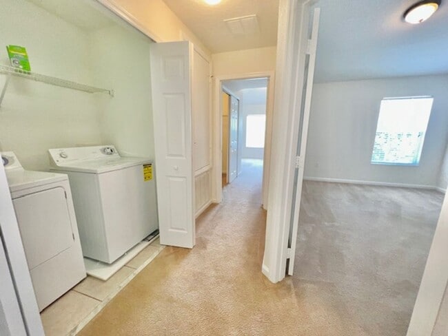 Building Photo - MOVE IN AUGUST! Beautiful 3 bed 2.5 bath townhome with large screened in back porch & 1 car attac...