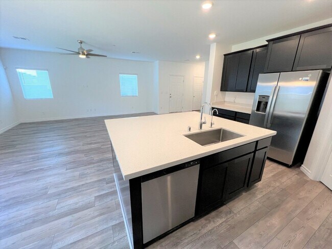 Building Photo - 4 BEDROOMS, 2.5 BATHS AT VILLIAGES AT TULE...