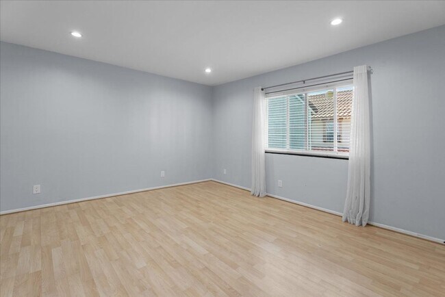 Building Photo - Updated Three Level Arcadia Townhome with Private Yard and Attached Garage