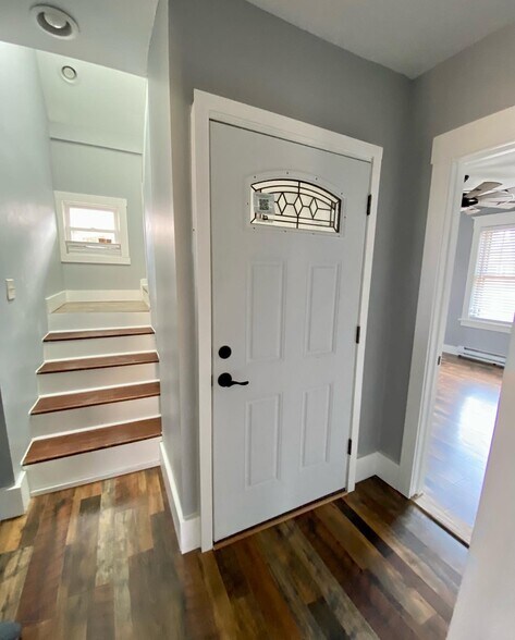 Front door and stairs to master suite in Apartment B. - 605 Beechwood Ave