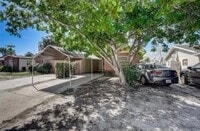 Building Photo - Charming 3/2 Duplex in West Bradenton with Private Yard and Carport