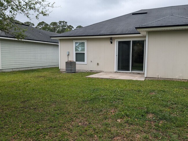 Building Photo - NOW AVAILABLE - 3/2 Duplex on this 12 mo Lease - Conveniently located off Lewis Speedway near St ...