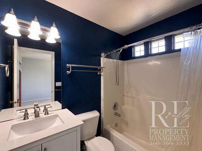 Building Photo - Dual Primary Suites, Huge Backyard Deck & Sun-Filled Living Spaces Near Everyday Conveniences