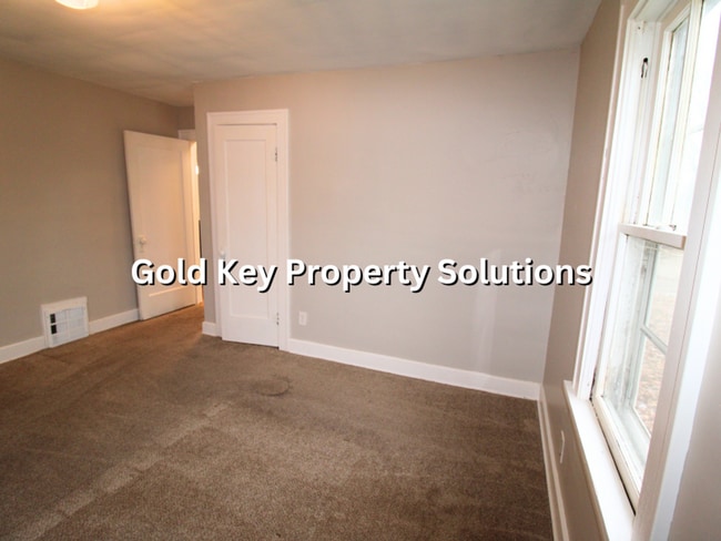 Building Photo - Attractive 2 BR 1 BA House with 2-Car Garage and Covered Porch (NO SECTION 8)