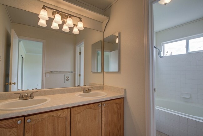 Building Photo - Beautiful home with 3 bedrooms, 2 1/2 bathrooms, 2-car garage ready to move in!  NO PETS & NO SMO...