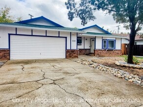 Building Photo - Spacious 3-Bedroom House with Gated Pool i...