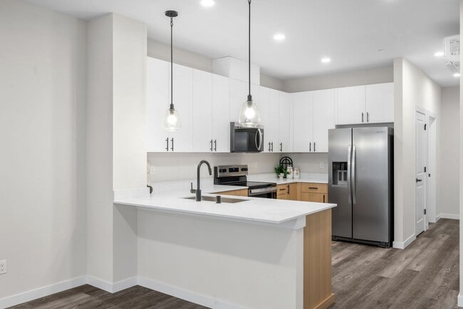 Building Photo - New Construction Luxury Townhome - Bright & Sunny End Unit