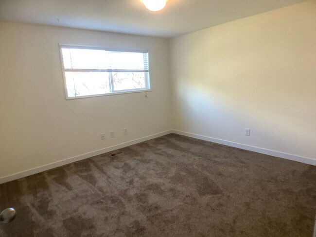 Building Photo - Three bedroom home with large yard| Available July!