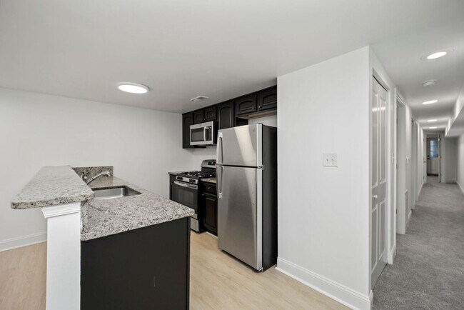 Building Photo - Sunlit & Fully Updated 2BR/1BA Condo in the Heart of U Street Corridor