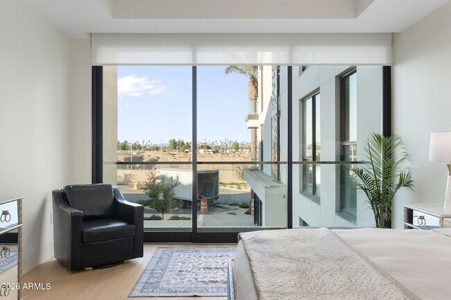 Building Photo - 6587 N Palmeraie Blvd