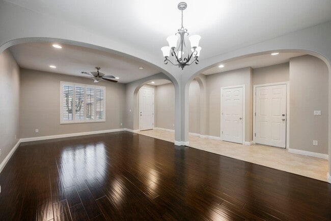Building Photo - Single Story w/ duel primary suites gated ...