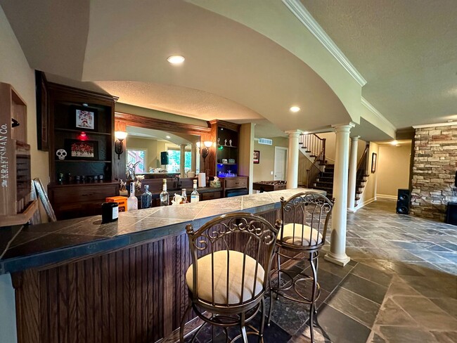 Building Photo - {9003} Wilshire Farms Reverse 1.5 Story Ho...