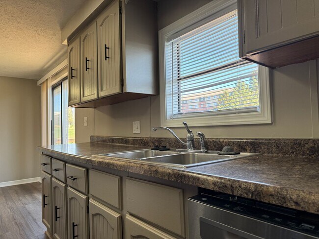 Building Photo - Bright and spacious split-entry home with a finished lower level, large yard, and plenty of updates!