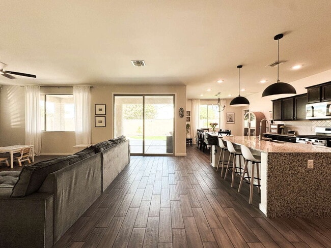 Building Photo - "Spacious 4-Bedroom, 2.5-Bathroom SOLAR Home in Mesa del Sol!"