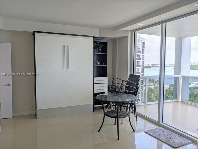 Building Photo - 10275 Collins Ave