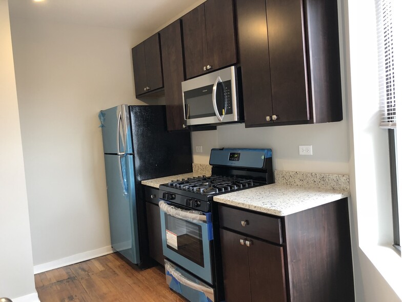 Building Photo - 4821 N Christiana Ave