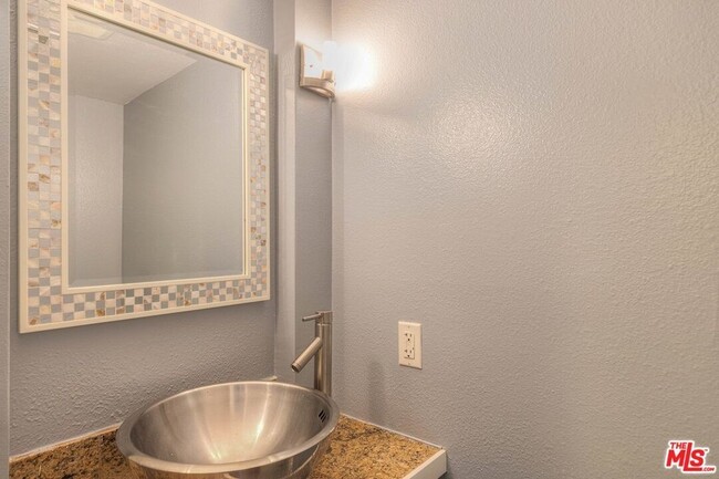 Building Photo - Furnished (also available unfurnished - please inquire) 3-Bedroom Townhome in a Gated Palm Spring...