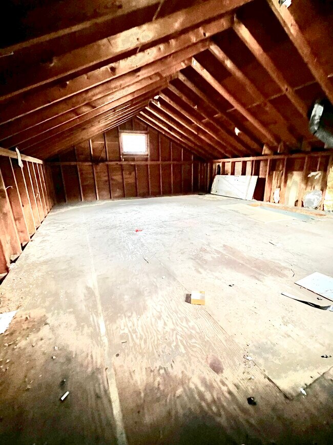 large storage area above garage - 211 Marian Ave