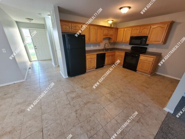 Building Photo - Beautiful and Spacious Louisburg Townhome-Available in JUNE!!