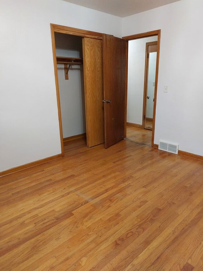 Building Photo - Corner lot with fenced in backyard!