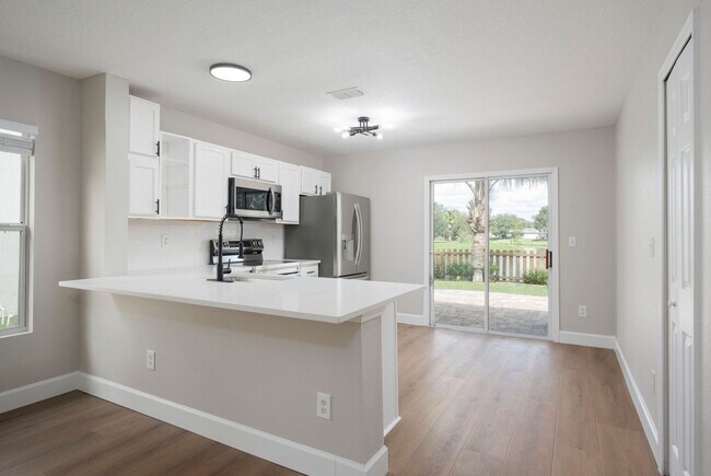 Building Photo - Fully Renovated Samara Lakes Home with Stunning Water Views!