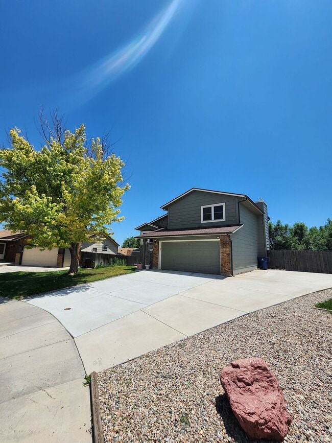 Building Photo - Spacious 4-Bedroom Home with RV Parking in...