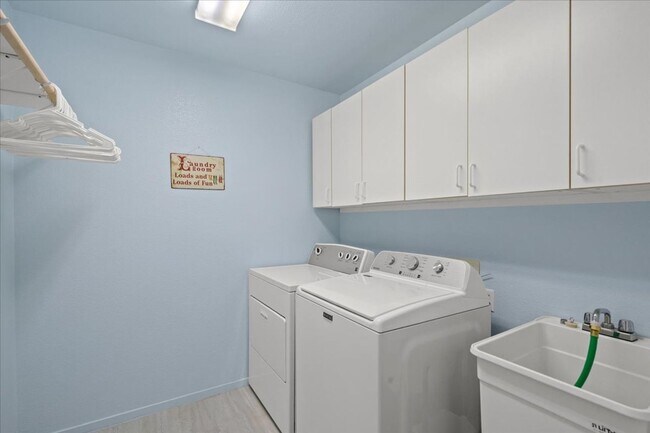 Building Photo - Multiple Living Areas 4-Bedroom Retreat with Vaulted Ceilings & No Carpet