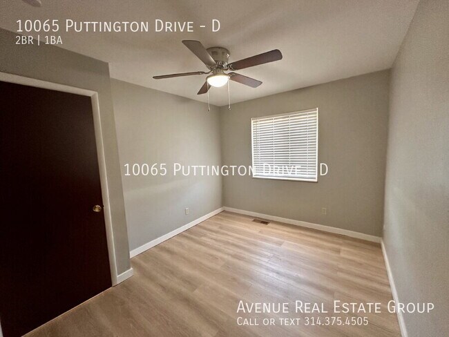 Building Photo - 10065 Puttington Dr