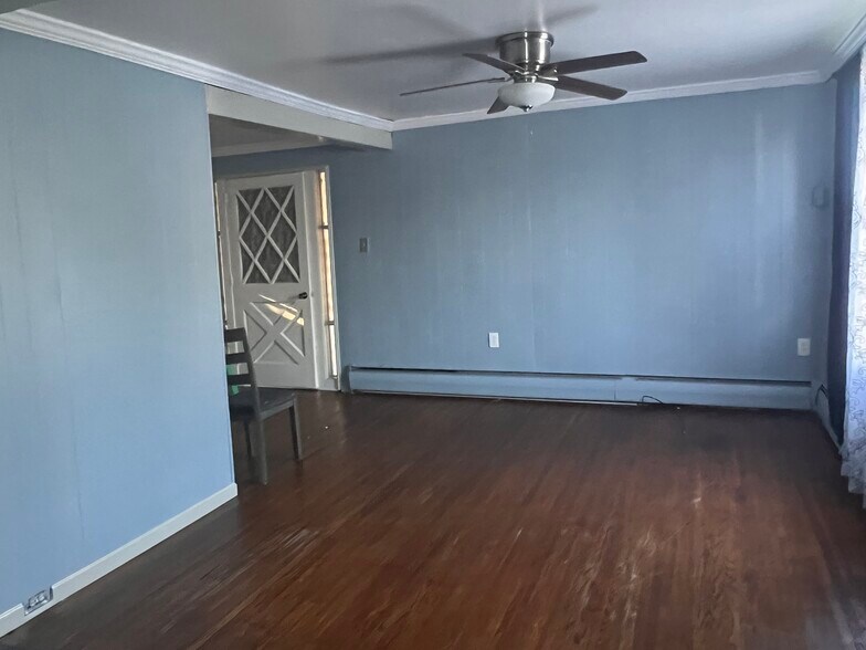 Living room and front door to front porch - 1726 Temple Ave